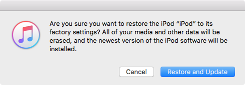 iTunes confirmation dialog with Restore and Update button
